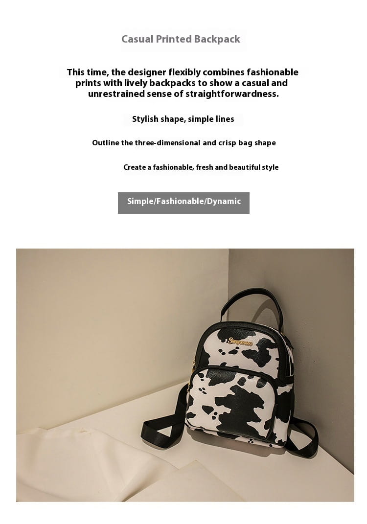 Mini backpack cow and snake print Korean style featuring black and white cow print casual design with black straps.