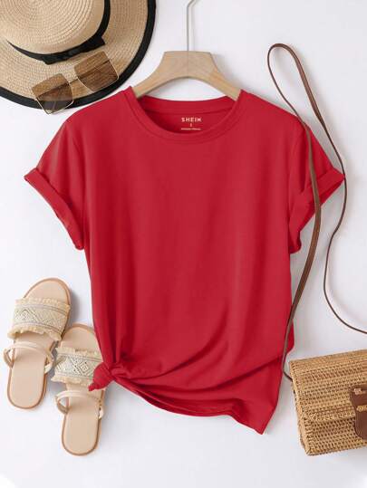 A red velvet short sleeve casual tee with a round neckline and a knotted hem.