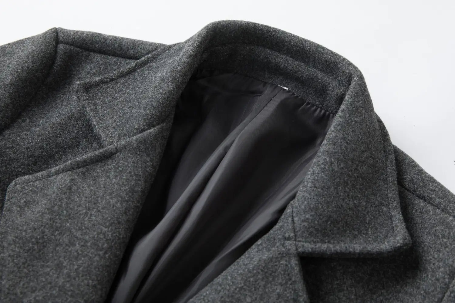 Men double breasted wool overcoat mid length coat in dark gray with structured collar and black satin lining.