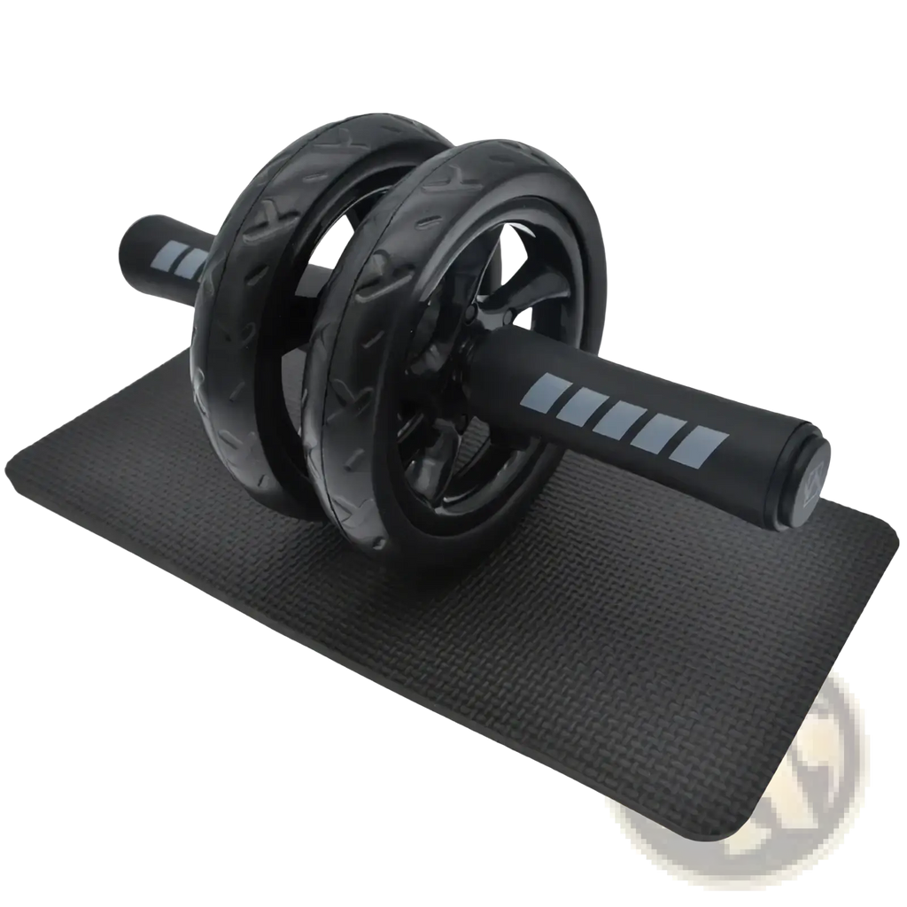Black ab roller wheel with textured wheels and grip handles on a matching black exercise mat for core workouts