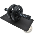 Black ab roller wheel with textured wheels and grip handles on a matching black exercise mat for core workouts