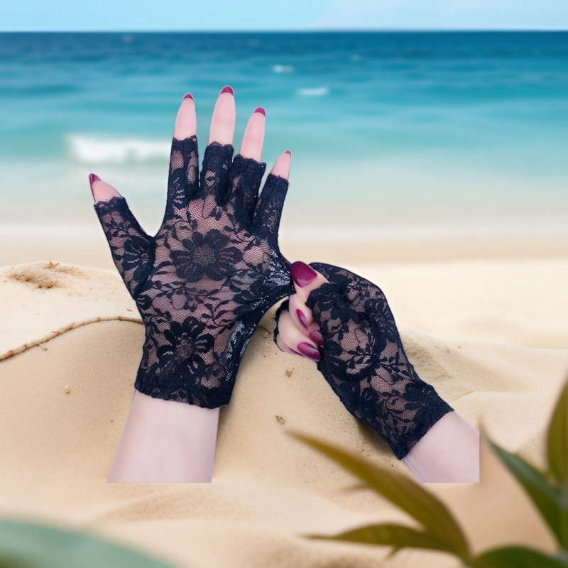 Black floral lace fingerless gloves designed for sun protection for women shown from the back side.