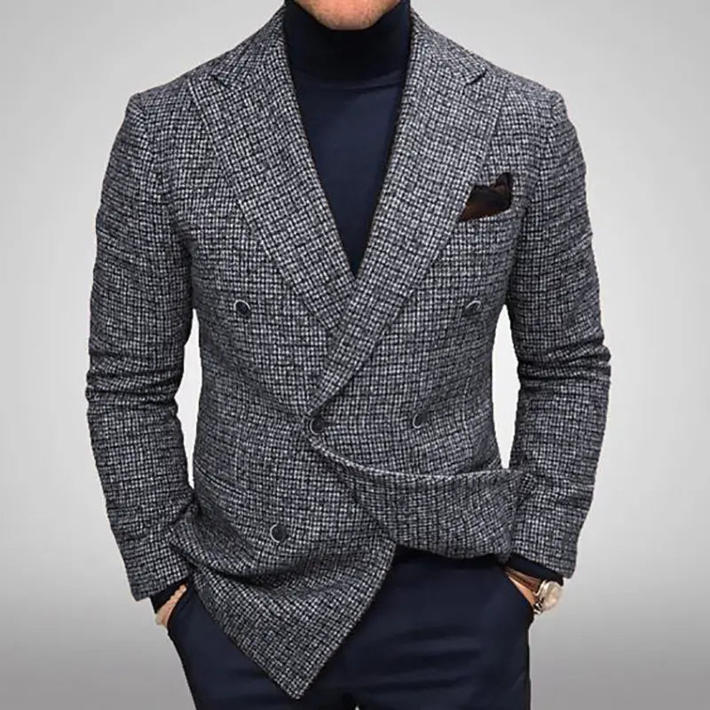 A stylish gray and black herringbone double-breasted knit blazer with a textured weave, dark buttons, and a matching pocket square for men.