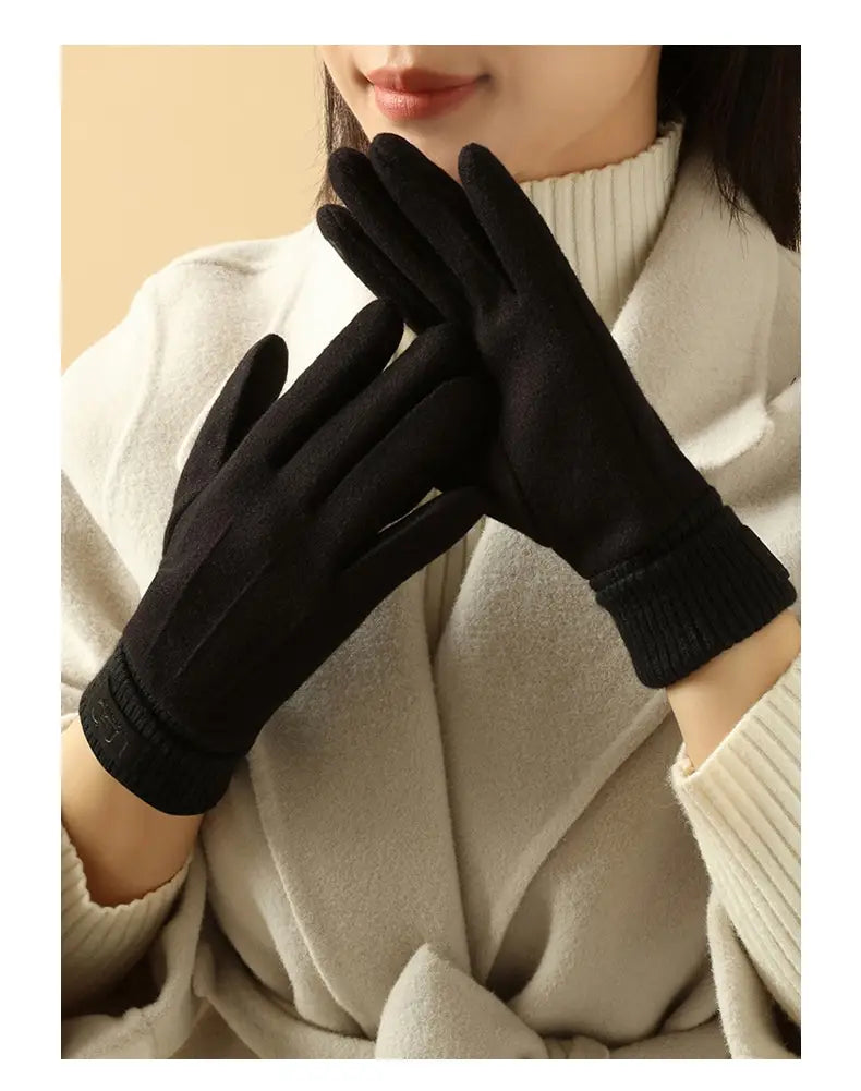 Schwarze Kaschmir-Touchscreen-Winterhandschuhe für Damen mit weicher Struktur und gerippten Bündchen, von der Rückseite dargestellt.