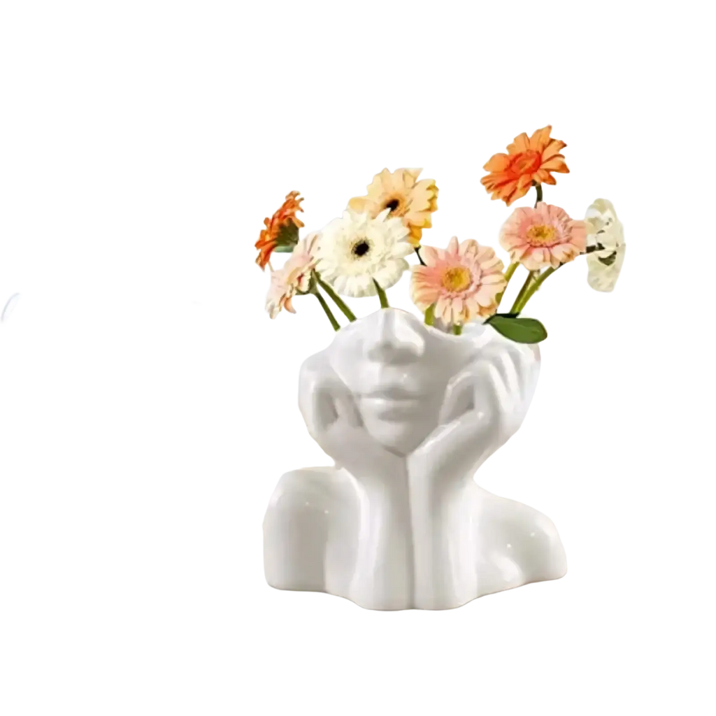 White ceramic abstract face makeup brush holder and vase shaped like a stylized human face with hands framing cheeks