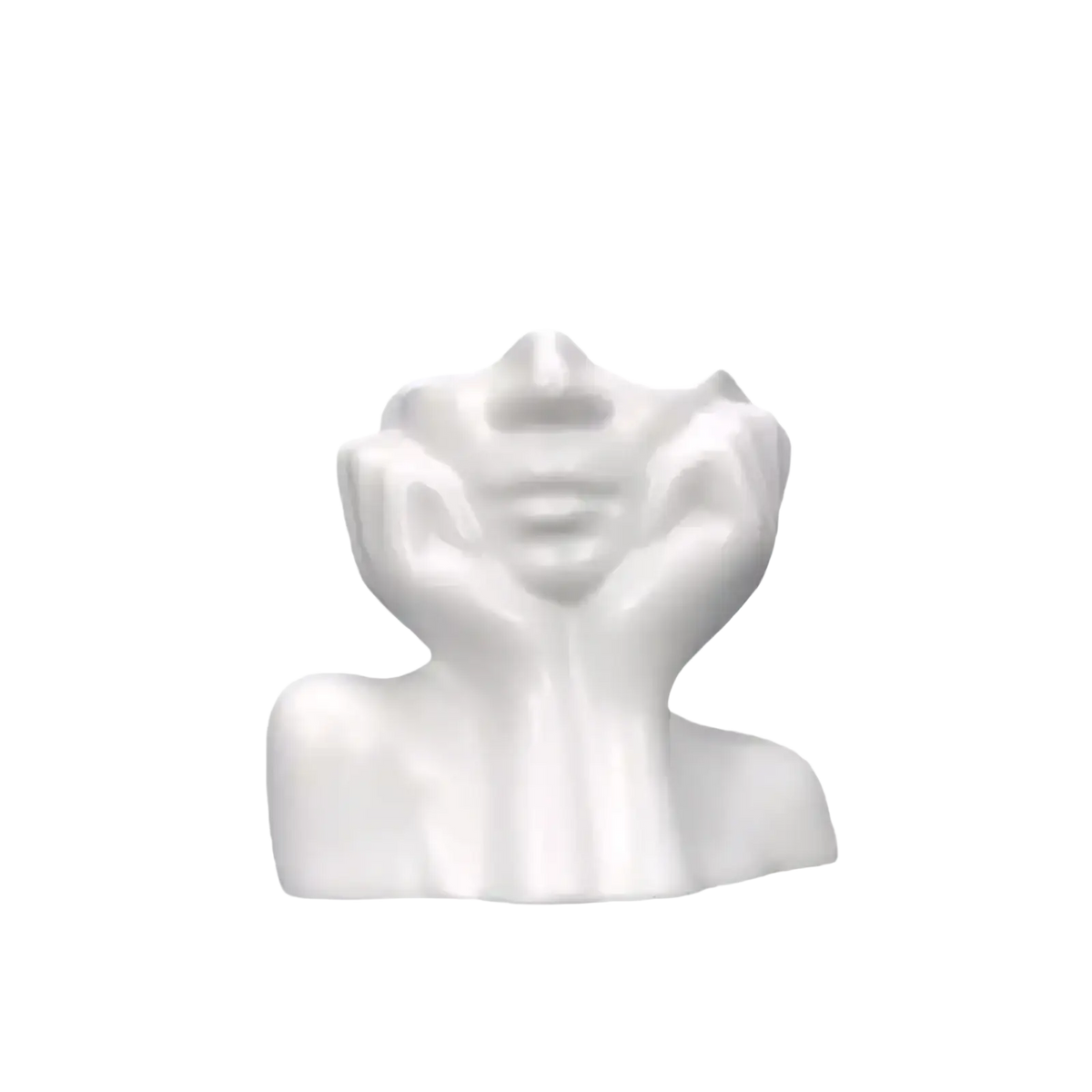 White ceramic abstract face makeup brush holder and vase featuring a bust sculpture with hands cupping the face