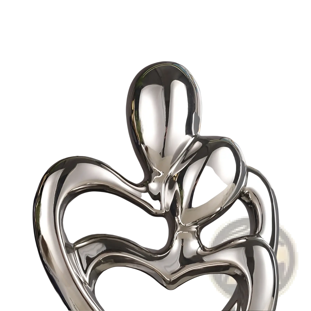 Shiny silver abstract heart ceramic figurine featuring two intertwined figures for modern home decor