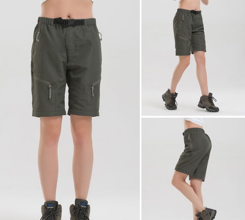 Dark olive green convertible tactical hiking pants featuring multiple zippered cargo pockets and a black elastic waistband.