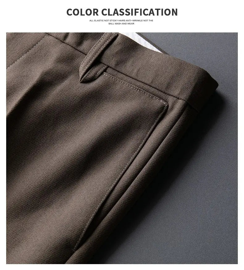 Men’s slim fit British style tailored straight leg trousers in dark brown with a sleek and smooth fabric finish.