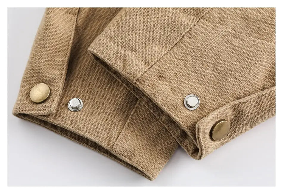 tan canvas sleeve of a retro washed detroit jacket men featuring brass and silver toned buttons