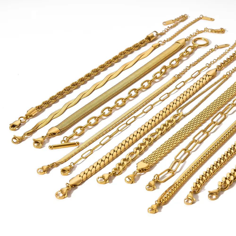 a collection of 18k gold pvd plated stainless steel chain link bracelets in various styles including twisted snake-like and link designs