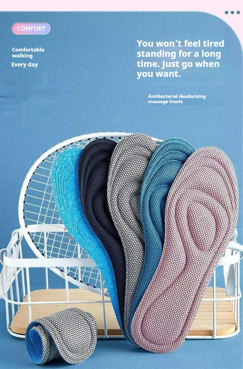 Colorful antibacterial massage insoles with deodorizing and shock absorbing arch support features displayed in a wire basket.