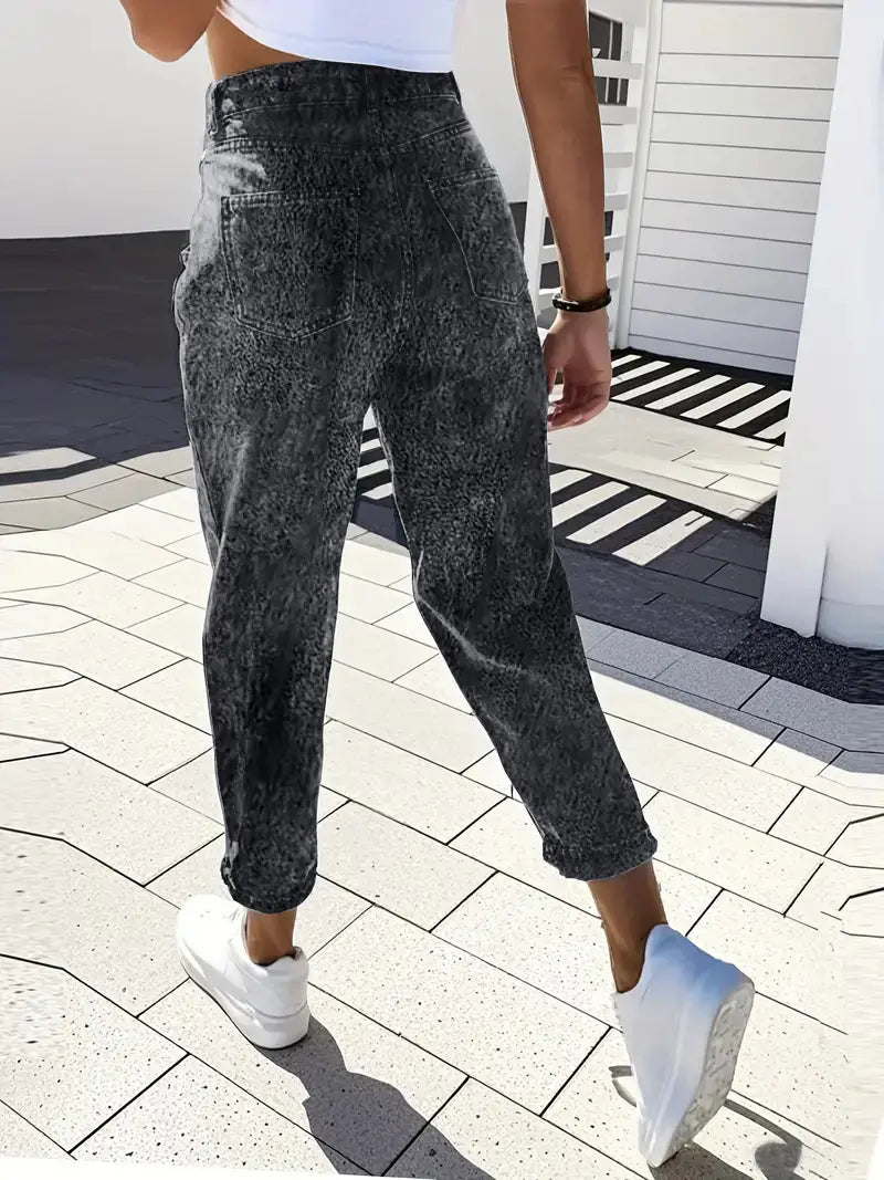 Plus size retro washed tapered denim jeans in high-waisted dark gray denim with a faded distressed texture and rolled cuffs.