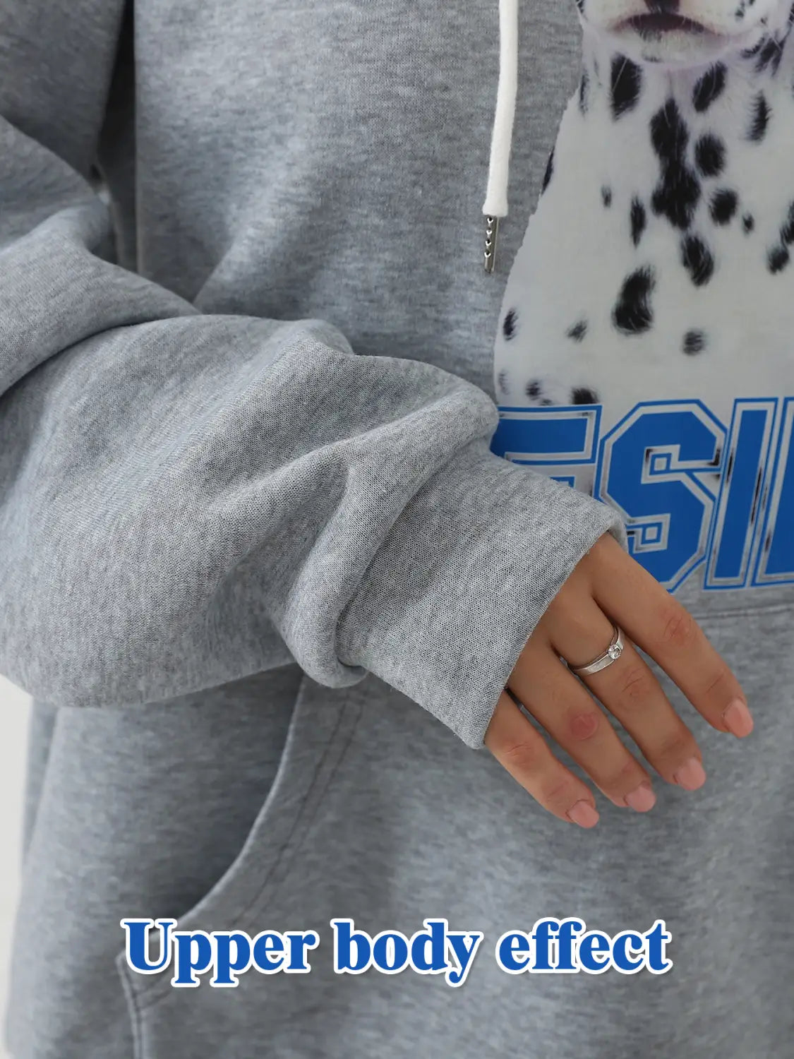 women’s dalmatian print hoodie featuring a gray heathered sweatshirt material with white drawstring and rolled-up sleeve and cat ear hood