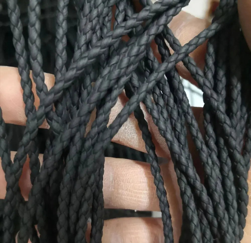 Black braided cord decorative rope tightly woven with textured surface for DIY fashion projects