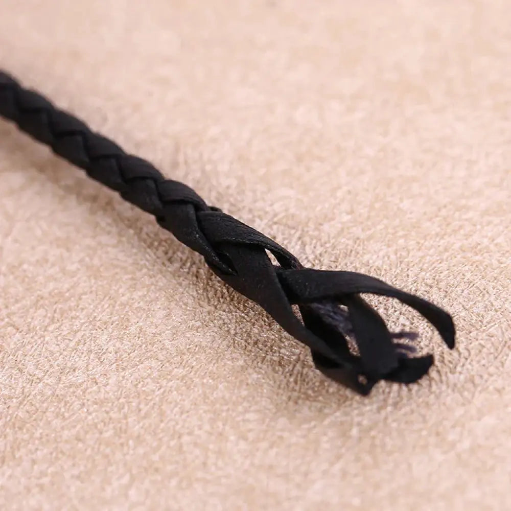 Black braided leather cord decorative rope with frayed ends for diy fashion projects