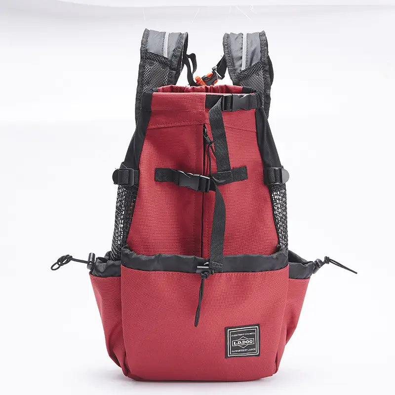 Red dog backpack with black straps and mesh side pockets featuring a breathable mesh material and drawstring top closure for pet carrier use in gray.