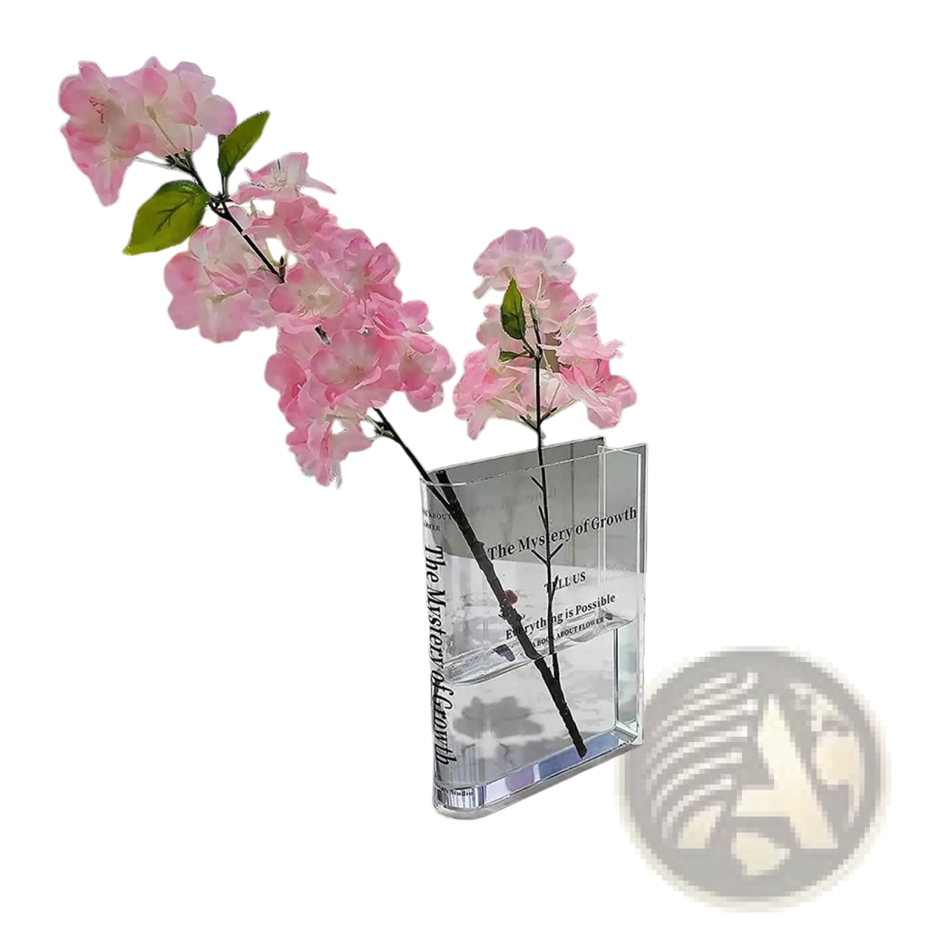 Clear acrylic rectangular vase with black text holding two pink artificial flower branches for modern home decor