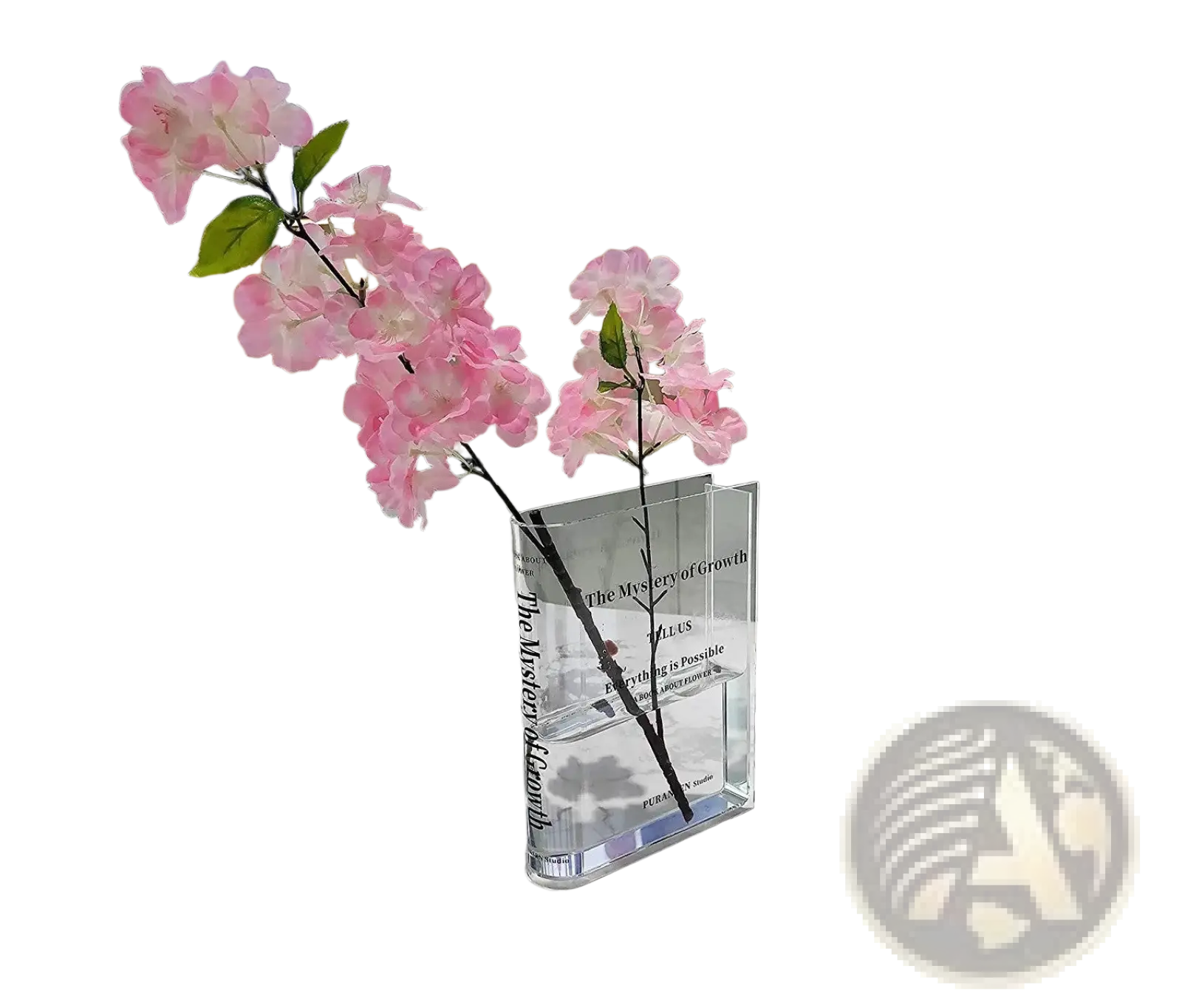 Clear acrylic rectangular book flower vase with black etched text holding pink artificial flowers for modern home decor
