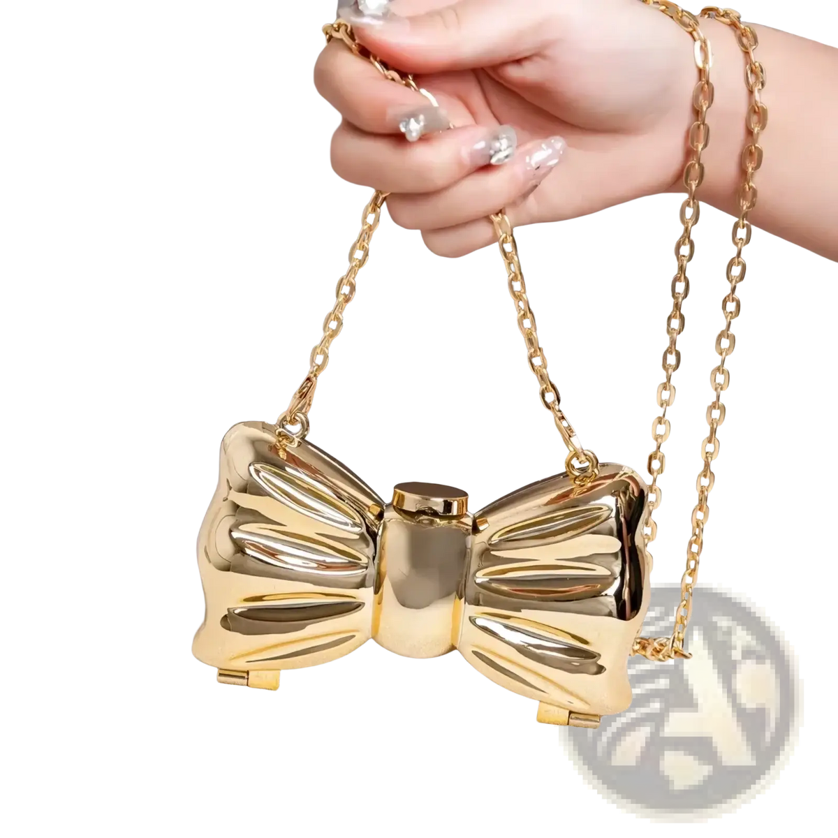 Gold metallic acrylic bow crossbody clutch bag with chain strap in metallic gold and silver finish