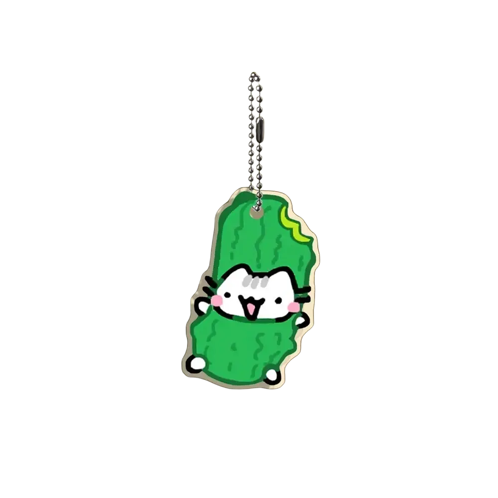 Acrylic cat keychain featuring a green cartoon-style cat charm with pink cheeks inside a pickle-shaped rubber holder