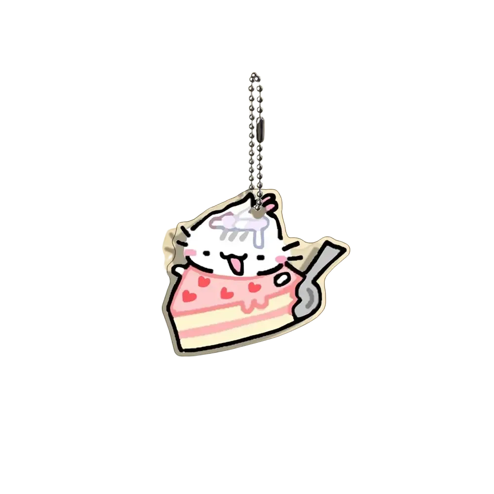 Acrylic cat keychain featuring a pink and white layered cake design with a cute cartoon cat and silver ball chain