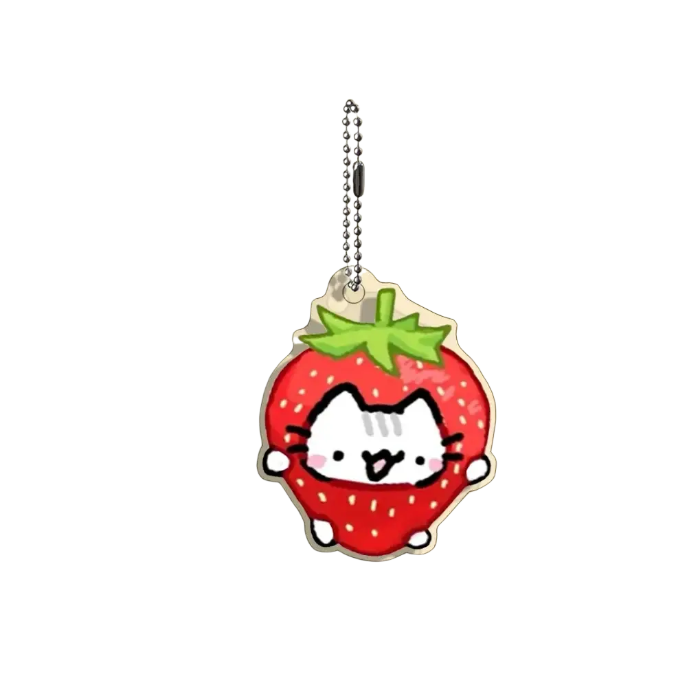 Acrylic cat keychain in red strawberry shape featuring a cute white cat with pink cheeks and green leaves top
