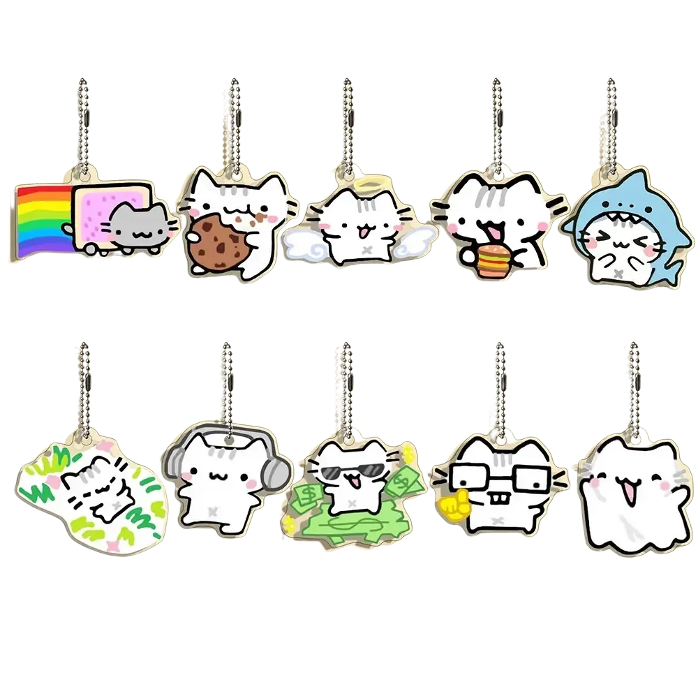 Set of ten clear acrylic cat keychains featuring colorful cartoon designs with whimsical outfits and accessories