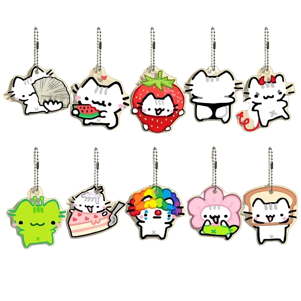 Set of ten clear acrylic cat keychains featuring cute cartoon cats in whimsical poses and colorful outfits