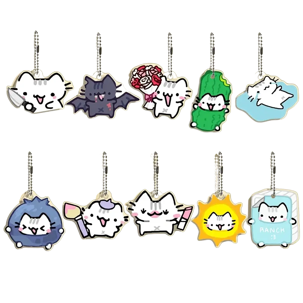Ten translucent acrylic cat keychains in whimsical outfits featuring cartoon designs in a 10-piece gift set