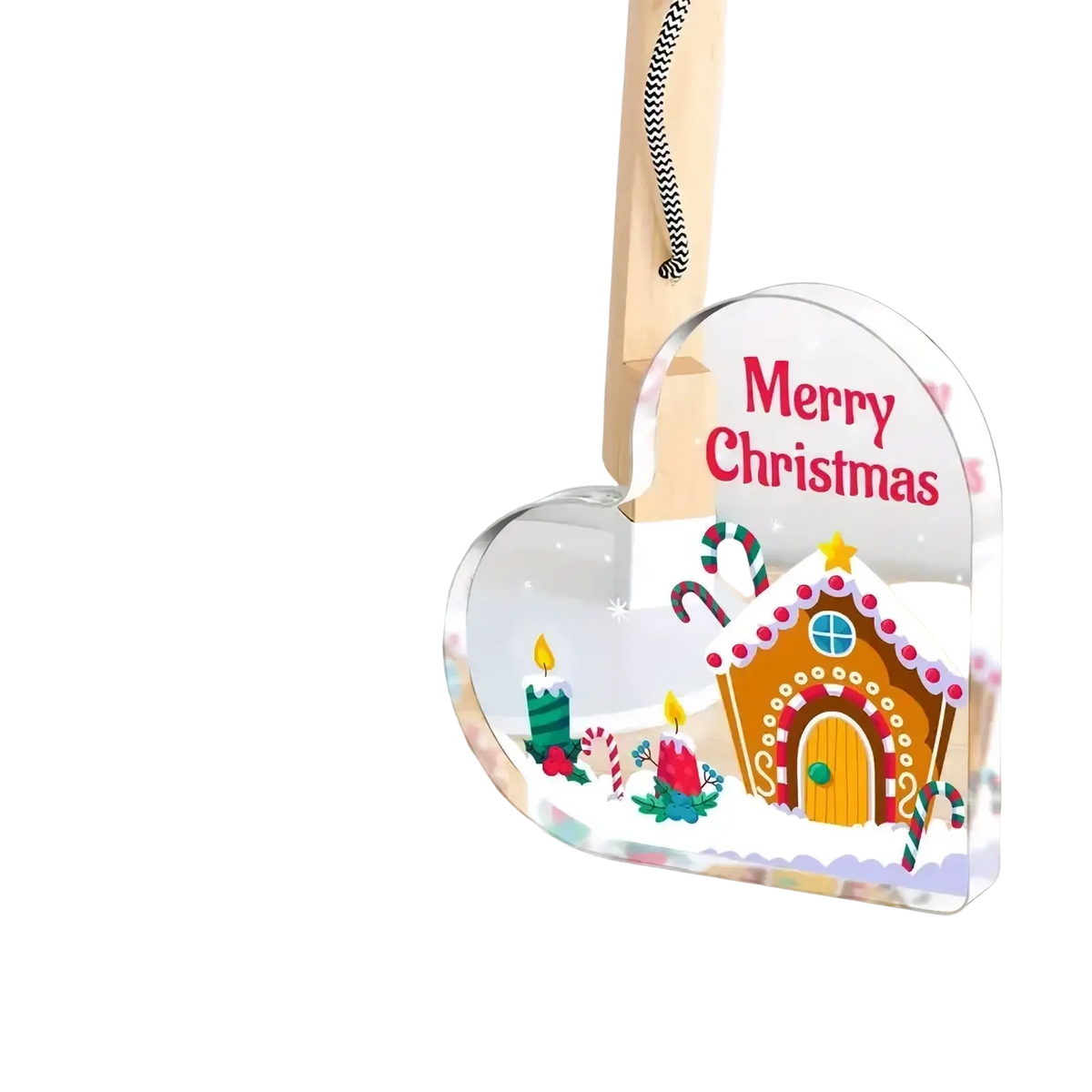 Clear acrylic heart-shaped Christmas ornament with colorful gingerbread house scene on desktop stand