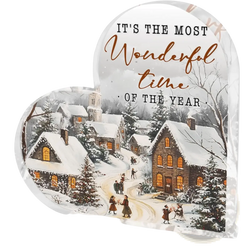 Acrylic Christmas heart tabletop decoration with snowy village scene and warm-lit windows featuring festive script