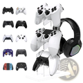 Clear acrylic gaming controller stand and headset holder displaying multiple white PlayStation controllers and a black RGB headset