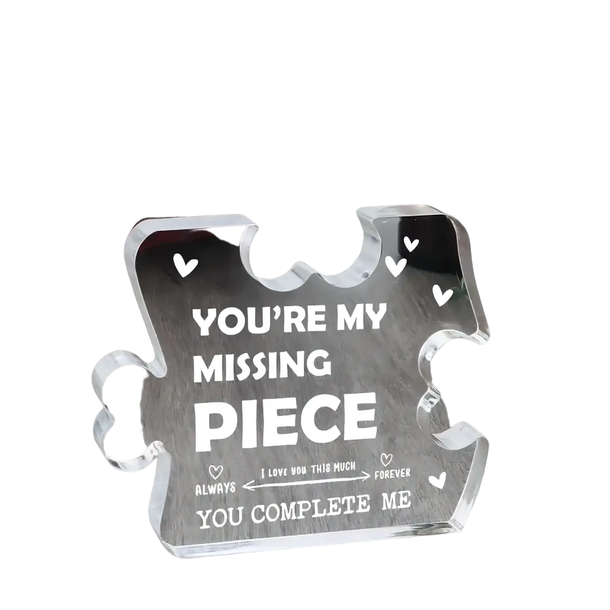 Clear acrylic puzzle piece plaque with engraved white text and hearts for couple keepsake gift