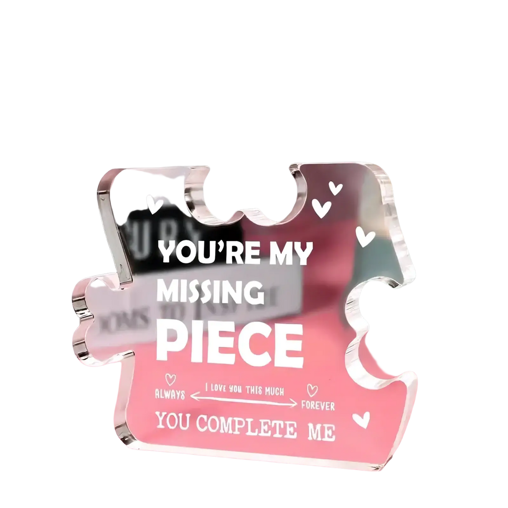 Clear acrylic puzzle piece couple keepsake gift plaque with engraved white text and heart motifs