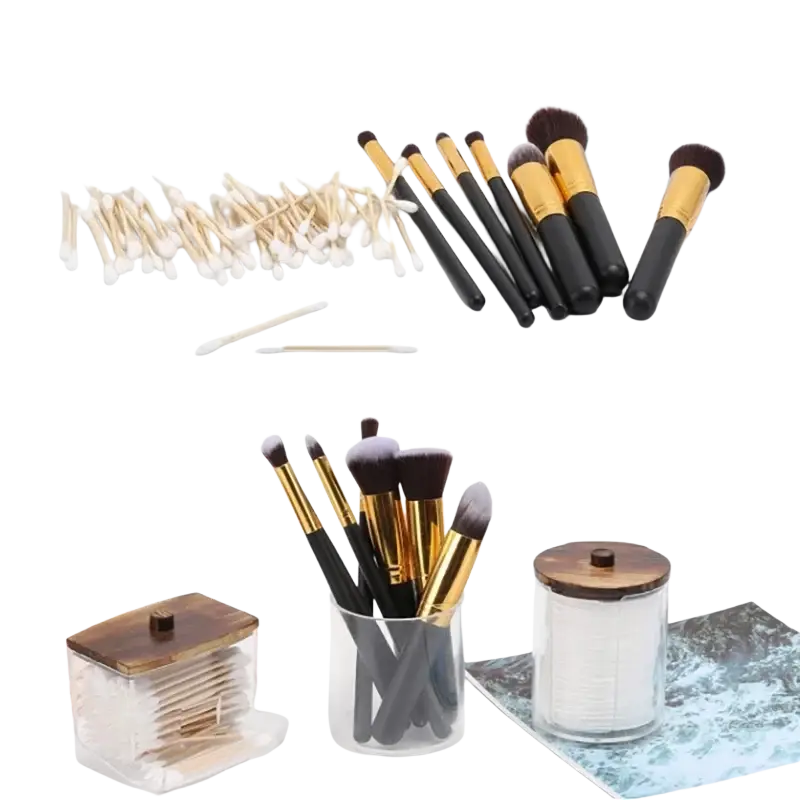 Set of makeup brushes with black handles and gold ferrules featuring soft bristles in various sizes for acrylic q-tip and cotton ball storage jar set
