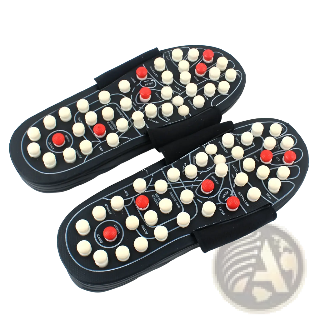 Black acupressure massage slippers for men and women with white and red acupressure points on the soles