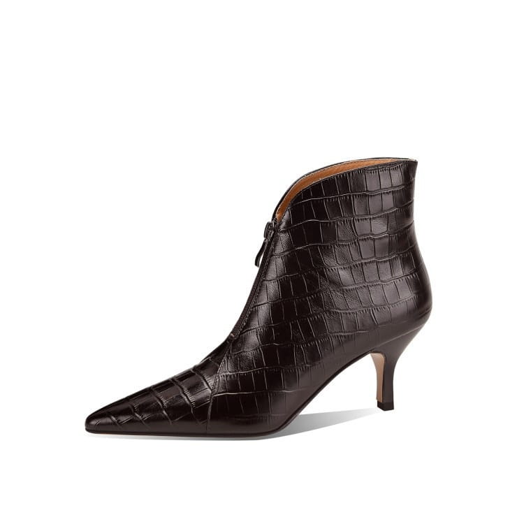 Dark brown croc embossed leather stiletto ankle boot with pointed toe and slender heel shown from the back side.