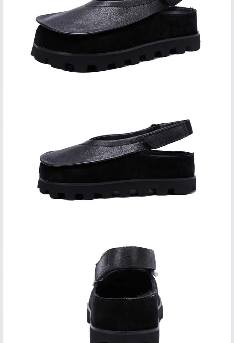 Schwarze Ledersandalen mit Plateau mit einem wuchtigen Retro-Design, Wildleder-Obermaterial und Lederriemen mit offenem Zehen-Bereich.