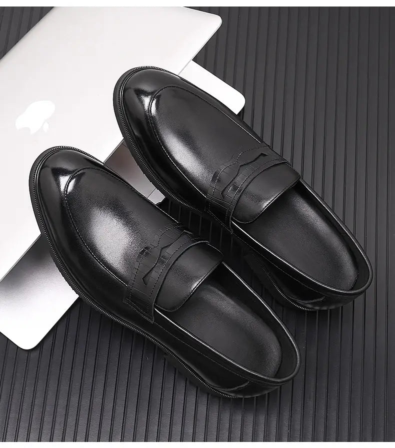 Men’s brown cowhide leather height increasing formal loafer with polished finish and black rubber sole.