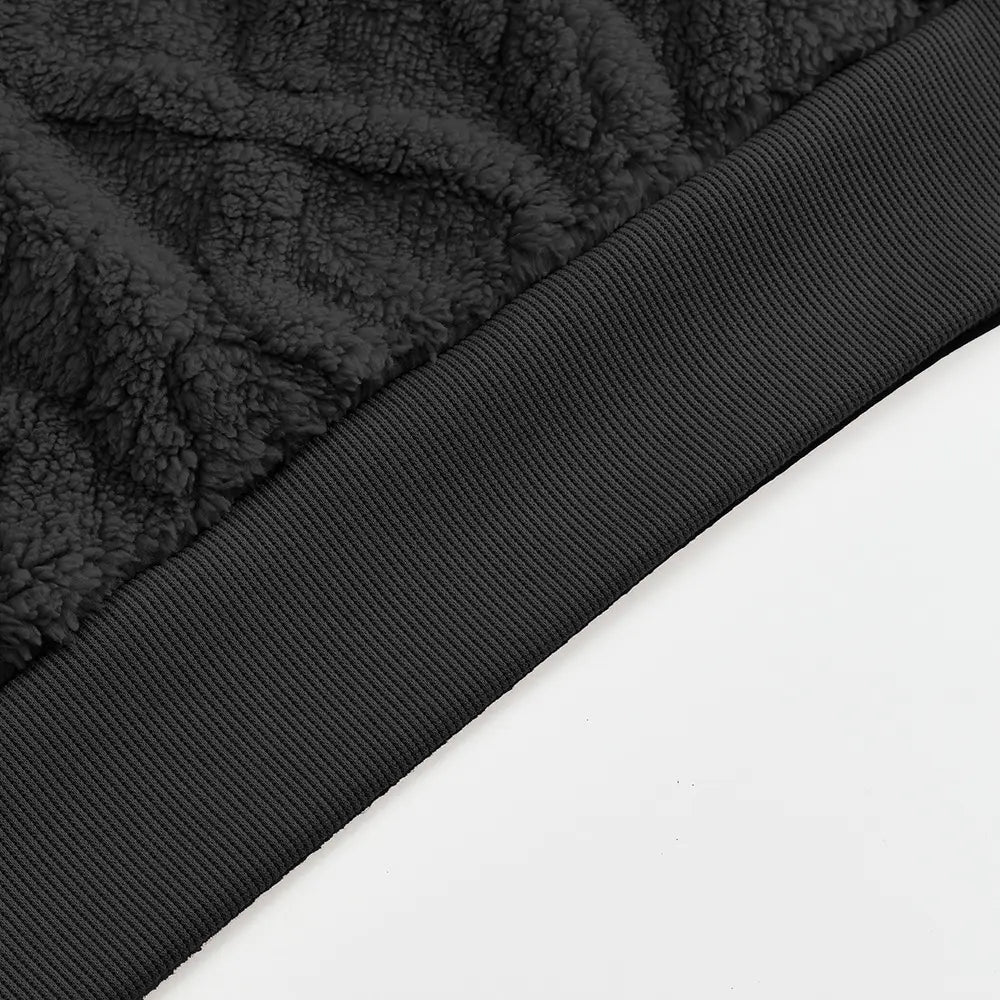 Men’s black textured fleece lined knit hoodie with ribbed knit trim and fleece lining for warmth and comfort.