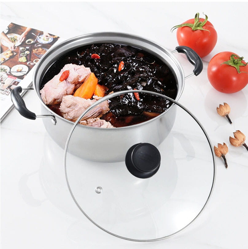 Silver stainless steel pot with black handles and clear glass lid with black knob from a 5-piece stainless steel induction cookware set.