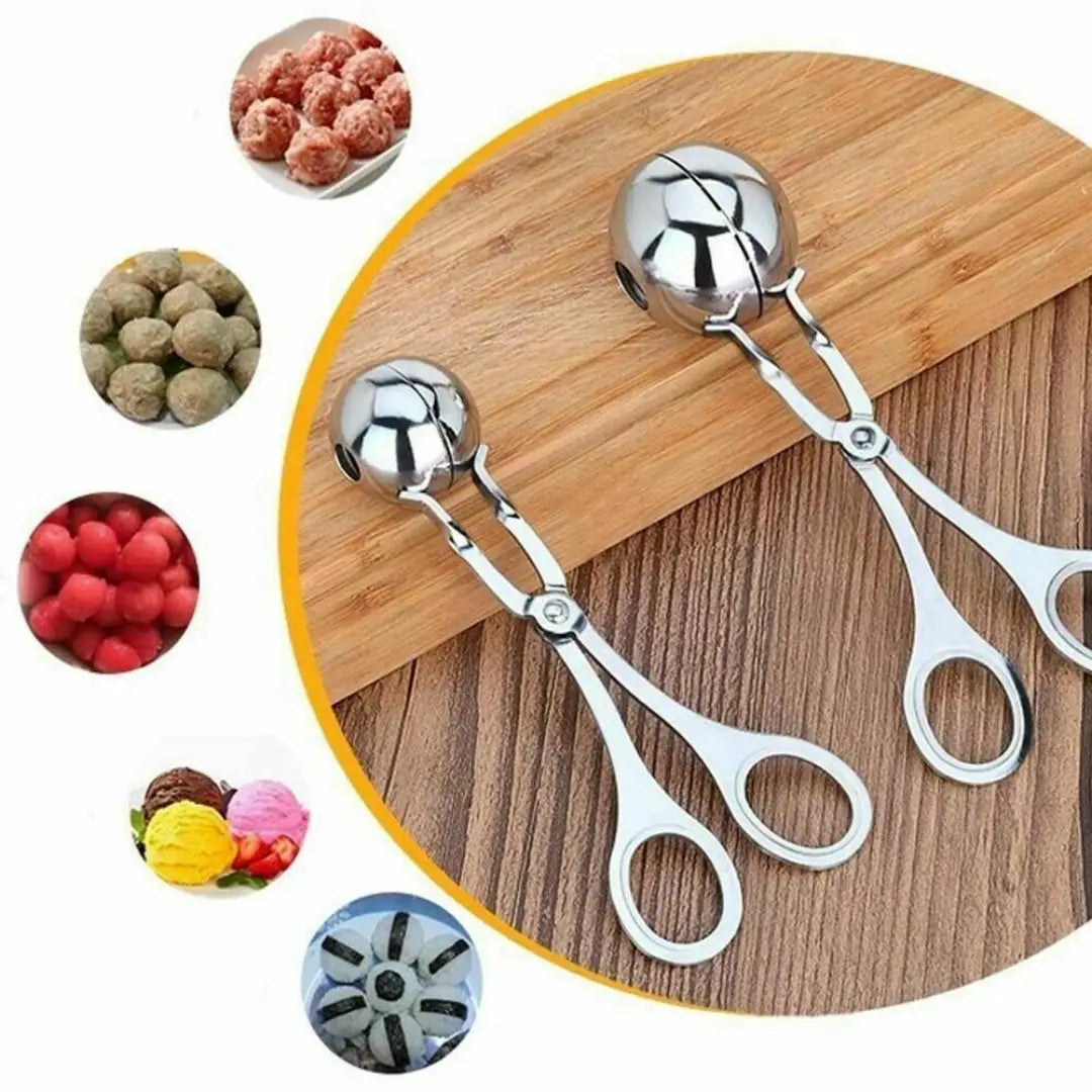Stainless steel meatball maker tongs featuring a shiny ball-shaped scoop with dual handles for easy gripping and food shaping.
