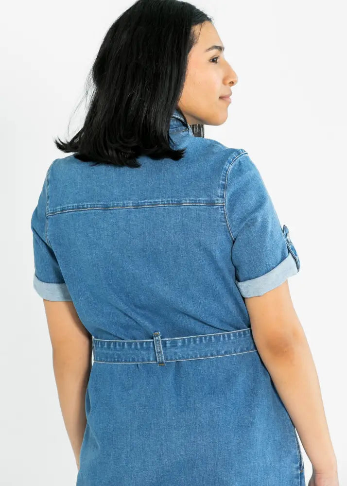 A blue denim midi dress with short sleeves and a belted waist featuring button front closures