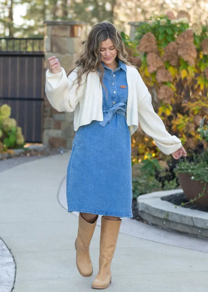 Blue denim midi dress with button front and tied waistband featuring belt for stylish casual wear