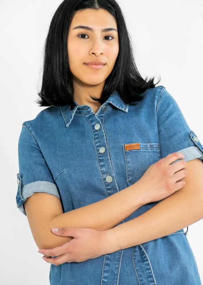 Ada denim button front midi dress with belt in blue denim featuring rolled sleeves and chest pocket with orange label