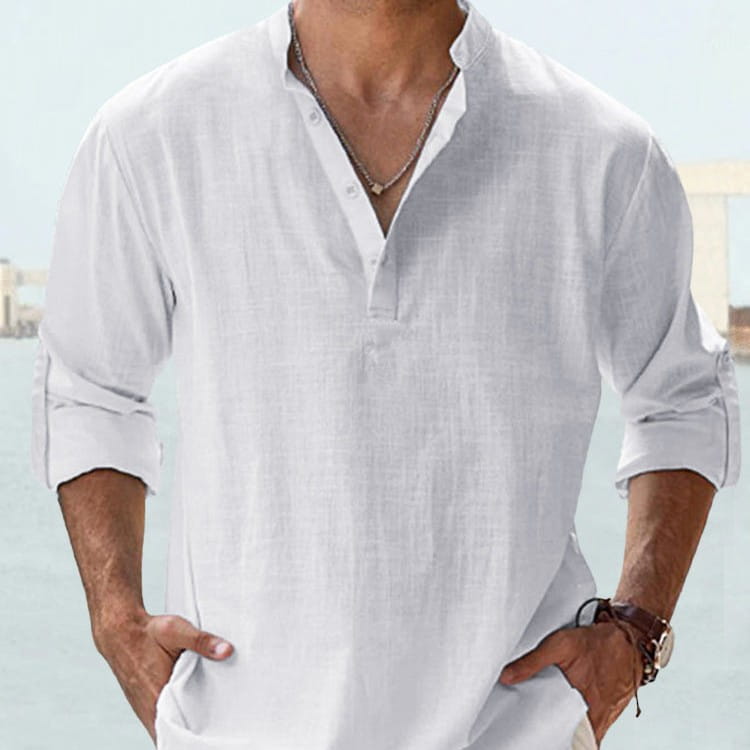Men’s relaxed fit cotton linen long sleeve shirt in white linen with button-up front, collar, and rolled sleeves.