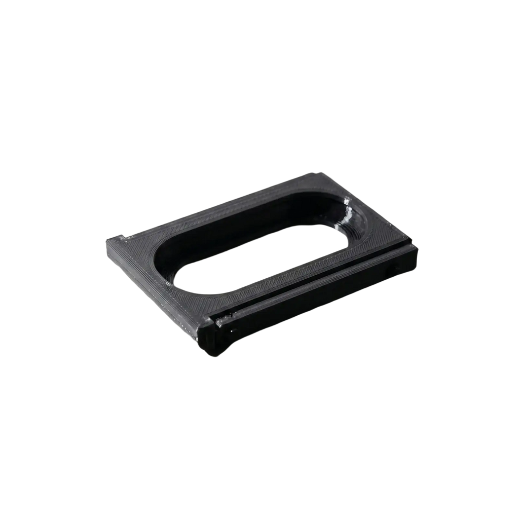 Black rectangular 3d-printed adapter bracket frame with central oval cutout for fitbit air to whoop 5.0 connection