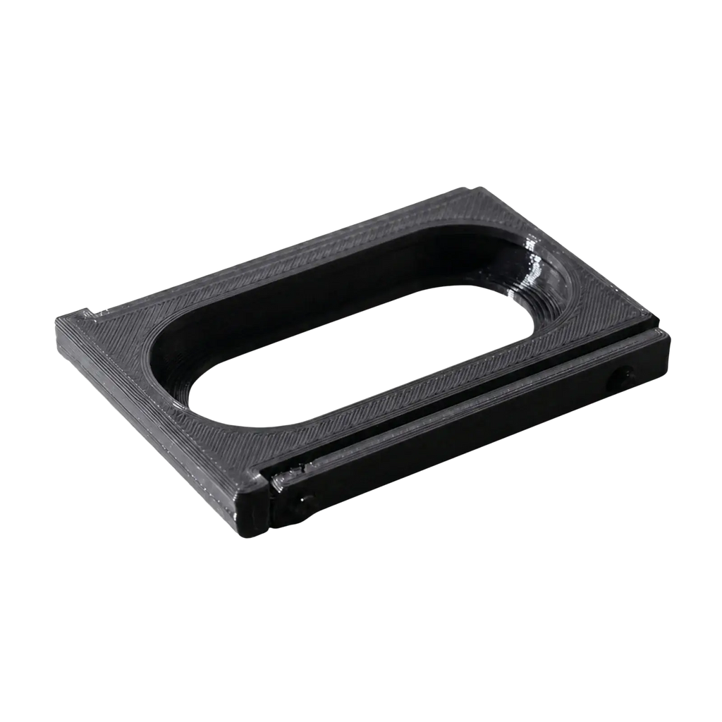 Black rectangular 3d printed adapter bracket frame with textured surface and oval cutout for fitbit air to whoop 5.0