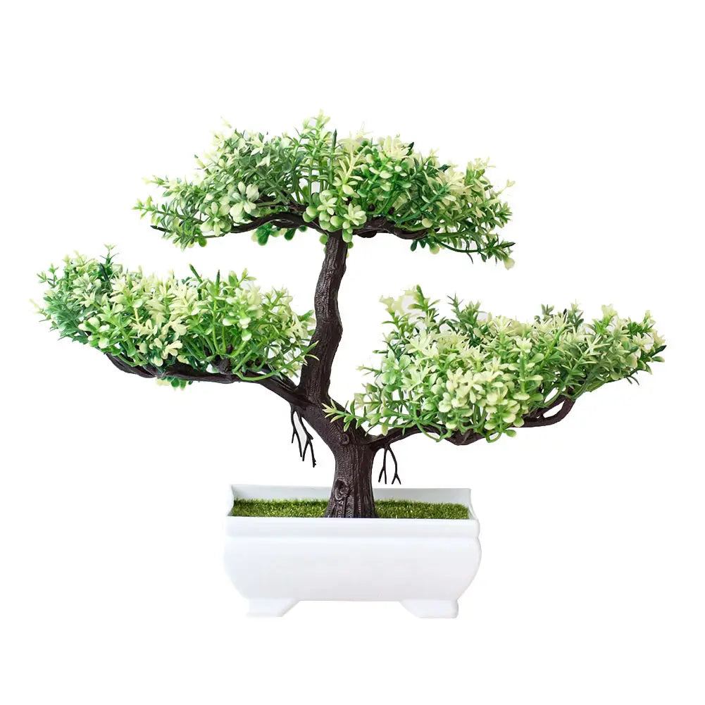 A miniature artificial bonsai tree with a dark brown intricately branched trunk and lush green foliage in a sleek white ceramic pot displayed as part of a four-pack set.